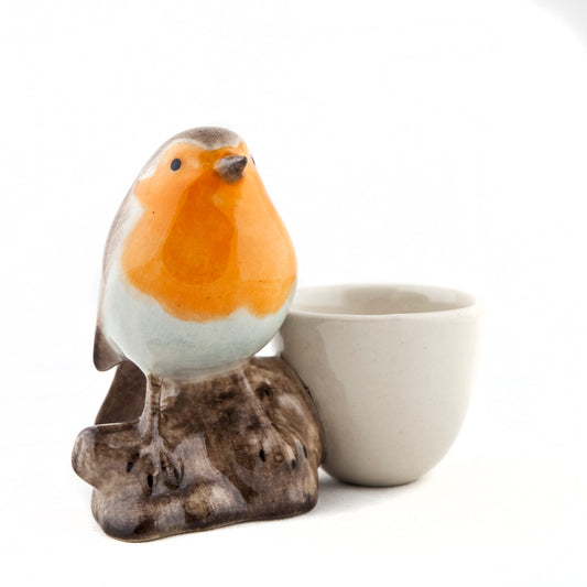 Robin with egg cup