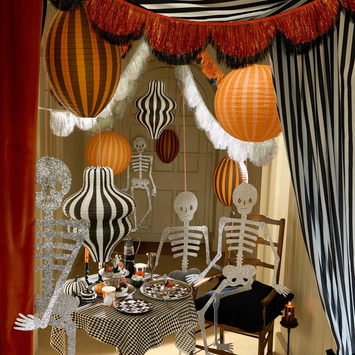 Orange and black tinsel scallop garland